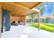 Relaxing patio space with wooden pergola and comfortable seating area at 2942 N 81St Pl, Scottsdale, AZ 85251