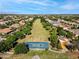 Community park with basketball court and playground visible from above at 3038 E Waterman Way, Gilbert, AZ 85297