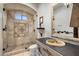 Spa-like bathroom with a large shower and decorative tile at 3038 E Waterman Way, Gilbert, AZ 85297