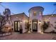 Lovely courtyard with fireplace and string lights at 3038 E Waterman Way, Gilbert, AZ 85297