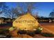 Community entrance with stone monument sign at Whitewing at Higley at 3038 E Waterman Way, Gilbert, AZ 85297