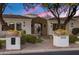 Front entry with walkway, landscaping, and large planters at 3038 E Waterman Way, Gilbert, AZ 85297