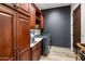 Well-appointed laundry room with ample cabinetry and modern appliances at 3038 E Waterman Way, Gilbert, AZ 85297