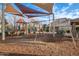 playground with swings and shade sails at 3038 E Waterman Way, Gilbert, AZ 85297