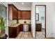 Convenient powder room with granite vanity and modern fixtures at 3038 E Waterman Way, Gilbert, AZ 85297