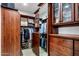 Large walk-in closet, custom built-ins, and mirrored doors at 3038 E Waterman Way, Gilbert, AZ 85297