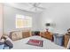 Bedroom with a wooden dresser and a ceiling fan at 3531 E Utopia Rd, Phoenix, AZ 85050