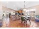 Kitchen with granite countertops, wooden cabinets, and tiled floors at 3531 E Utopia Rd, Phoenix, AZ 85050