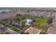 Aerial view of community pool, park, and homes at 3667 E Angstead Ct, Gilbert, AZ 85296