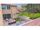 Elevated view of backyard patio and seating at 3667 E Angstead Ct, Gilbert, AZ 85296