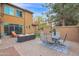 Patio with seating area and artificial turf at 3667 E Angstead Ct, Gilbert, AZ 85296