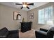 Home bar with black tufted seating and lighting at 3667 E Angstead Ct, Gilbert, AZ 85296