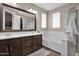 Double vanity bathroom with a soaking tub at 3667 E Angstead Ct, Gilbert, AZ 85296