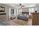 Main bedroom with plush bed and wood dresser at 3667 E Angstead Ct, Gilbert, AZ 85296