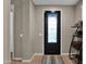 Entryway with black door, wood floors, and shelving at 3667 E Angstead Ct, Gilbert, AZ 85296