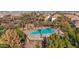 Community pool with surrounding landscape at 3667 E Angstead Ct, Gilbert, AZ 85296