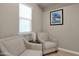 Small sitting area with two armchairs and a window at 3667 E Angstead Ct, Gilbert, AZ 85296