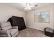 Bright bedroom with ceiling fan, window coverings and carpeting at 3675 E Parkview Dr, Gilbert, AZ 85295