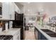 Modern kitchen with stainless steel appliances and white cabinets at 3675 E Parkview Dr, Gilbert, AZ 85295