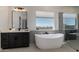 Spa-like bathroom with soaking tub, walk-in shower, and modern vanity at 39027 N 6Th Dr, Phoenix, AZ 85086