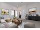 Relaxing living room with sectional sofa and built-in bar area at 39027 N 6Th Dr, Phoenix, AZ 85086