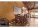 Charming dining area with a wooden table and four chairs at 3921 W Sharon Ave, Phoenix, AZ 85029