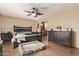 Spacious main bedroom with a large bed and walk-in closet at 3921 W Sharon Ave, Phoenix, AZ 85029