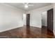 Bedroom with hardwood floors, wainscoting, and plantation shutters at 4017 E Wilshire Dr, Phoenix, AZ 85008