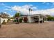 Backyard patio with hot tub, basketball court and covered seating area at 4017 E Wilshire Dr, Phoenix, AZ 85008