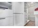 Spacious walk-in closet with ample shelving and drawer space at 4017 E Wilshire Dr, Phoenix, AZ 85008