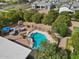 Aerial view of the pool, fire pit, and backyard providing an overview of the outdoor living spaces at 4024 E Hermosa Vista Dr, Mesa, AZ 85215