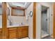 Bathroom with decorative sink, window, and a shower with decorative tile inset at 4024 E Hermosa Vista Dr, Mesa, AZ 85215