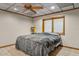 Bedroom featuring a bed, ceiling fan and a window at 4024 E Hermosa Vista Dr, Mesa, AZ 85215