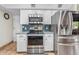 Kitchen featuring stainless steel appliances, tile backsplash, and plenty of cabinet space at 4024 E Hermosa Vista Dr, Mesa, AZ 85215