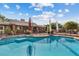 Inviting in-ground pool with views of the brick house, perfect for enjoying sunny days in a private backyard oasis at 4024 E Hermosa Vista Dr, Mesa, AZ 85215