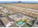 Stunning aerial view showcasing the home's private pool and neighborhood at 4125 W Bradshaw Creek Ln, New River, AZ 85087