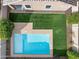 Aerial view showcasing a clean, modern pool and lawn at 4125 W Bradshaw Creek Ln, New River, AZ 85087