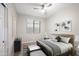 Cozy bedroom featuring a queen-size bed and natural light at 4125 W Bradshaw Creek Ln, New River, AZ 85087