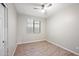 Spacious bedroom featuring wood-look floors and a ceiling fan at 4125 W Bradshaw Creek Ln, New River, AZ 85087