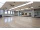 Spacious dance studio with hardwood floors and mirrors at 4125 W Bradshaw Creek Ln, New River, AZ 85087