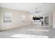 Living room with high ceilings and access to kitchen at 4125 W Bradshaw Creek Ln, New River, AZ 85087