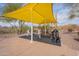 Outdoor fitness area with equipment and shade at 4125 W Bradshaw Creek Ln, New River, AZ 85087