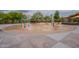 Community splash pad with spray features for children at 4125 W Bradshaw Creek Ln, New River, AZ 85087