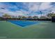 Dual lighted tennis courts with green surface at 4125 W Bradshaw Creek Ln, New River, AZ 85087