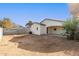 View of backyard and house exterior at 414 E Eason Ave, Buckeye, AZ 85326