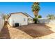 New construction home with a large backyard and block wall at 414 E Eason Ave, Buckeye, AZ 85326