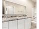 Double vanity bathroom with granite countertops at 414 E Eason Ave, Buckeye, AZ 85326