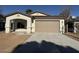 Newly constructed single-story home with attached garage and landscaped front yard at 414 E Eason Ave, Buckeye, AZ 85326