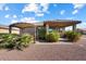 Home exterior with covered patio and pergola at 41703 W Mesquite Rd, Maricopa, AZ 85138