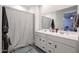 Modern bathroom with double vanity and a shower/tub combo at 4524 S 127Th Ln, Avondale, AZ 85323